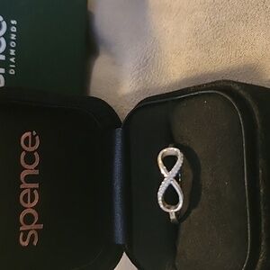 Spence Diamonds 14k white gold infinity ring.